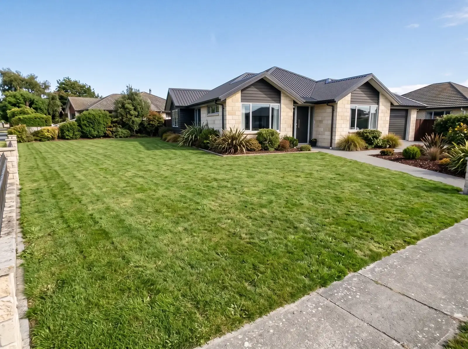 The same Oamaru lawn thick, even and weed-free a few weeks after treatment